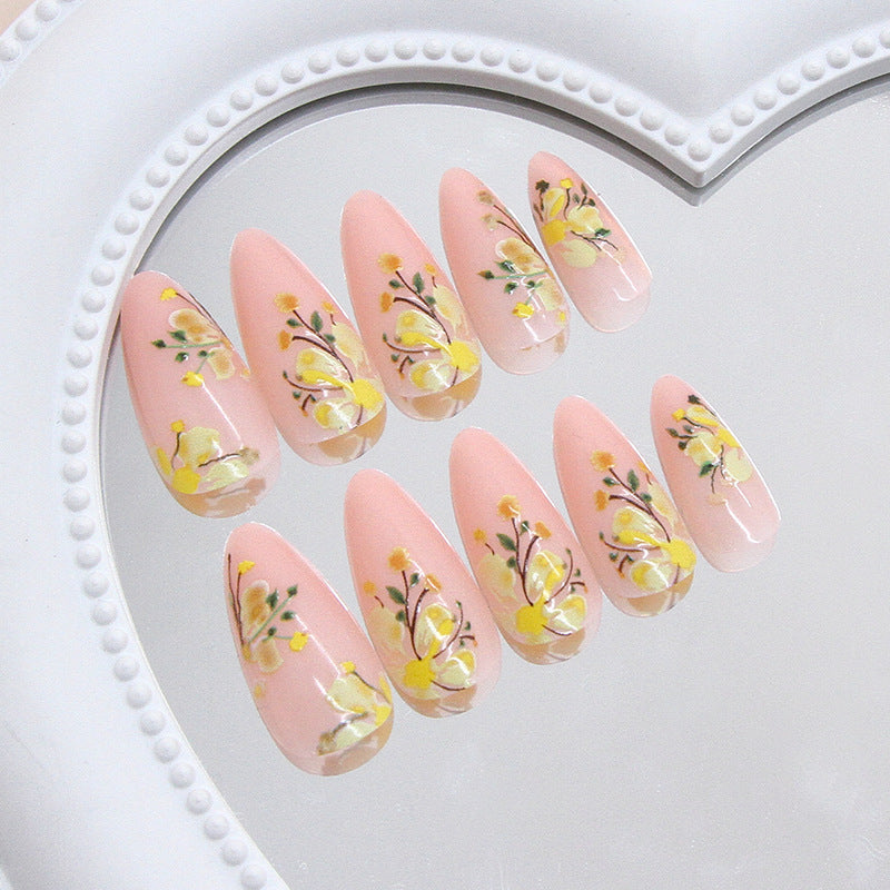 Floral Elegance Medium Almond Pink Press On Nail Set with Artistic Yellow Bloom Design