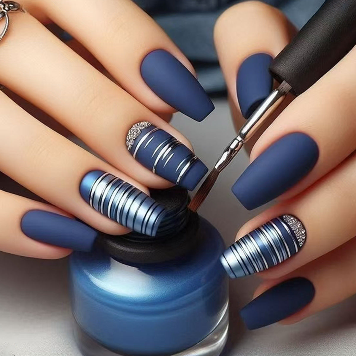 Oceanic Splendor Long Coffin Matte Blue Nails with Metallic Accent Stripes and Glitter Highlights