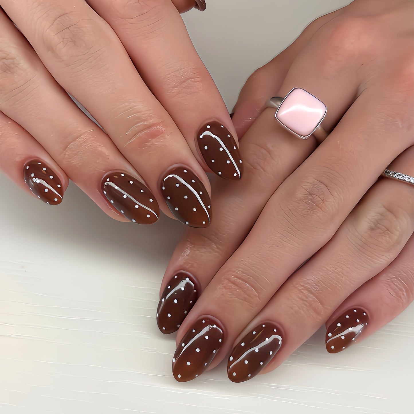 Chocolate Delight Short Almond Press On Nails in Rich Brown with White Dot Design