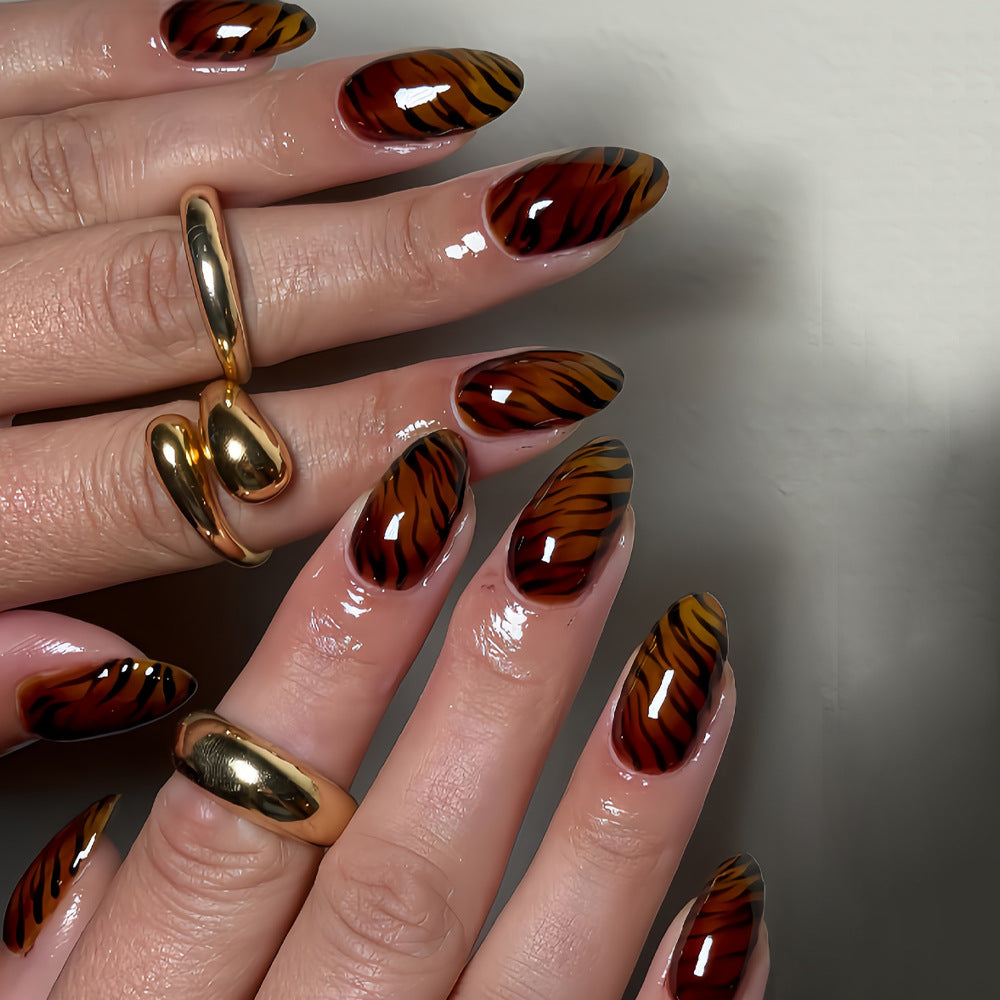Wild Jungle Elegance Long Almond Shaped Orange and Black Striped Press On Nail Set with Glossy Finish