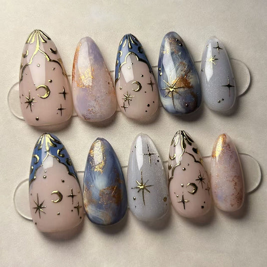 Celestial Dreams Medium Almond-shaped Lavender and Blue Press on Nail Set with Gold Star Accents