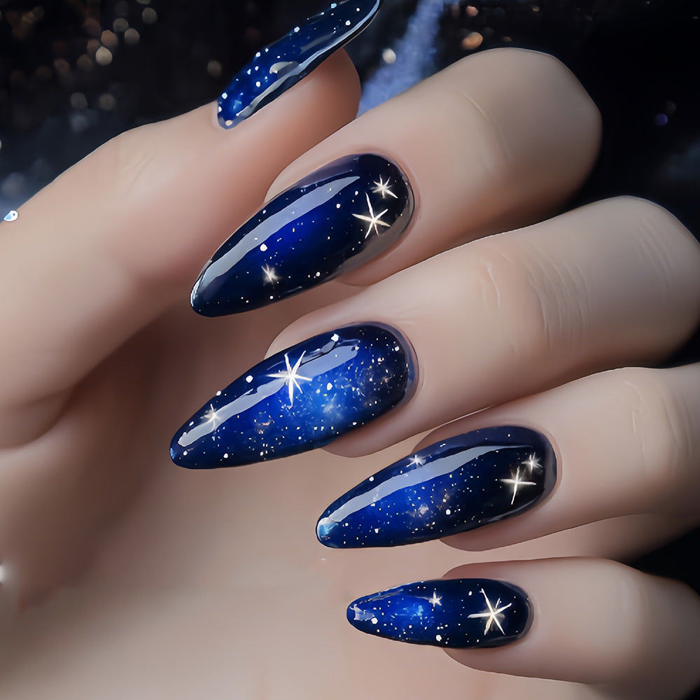Celestial Dream Long Almond Acrylic Nails Deep Blue Cosmic Sparkle Finish