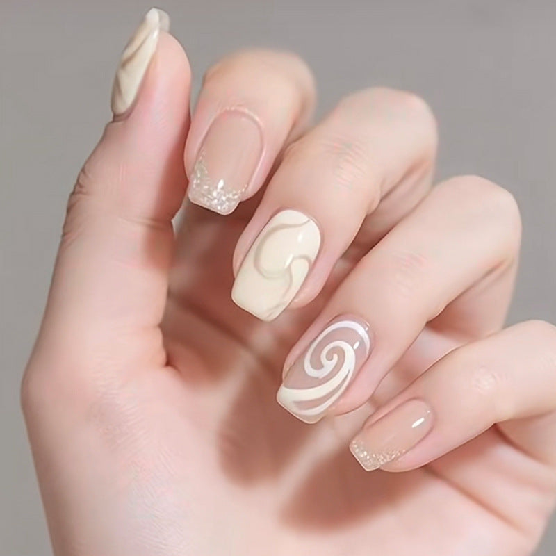 Whimsical Elegance Medium Square Beige Press On Nail Set with Swirl Design and Glitter Tips