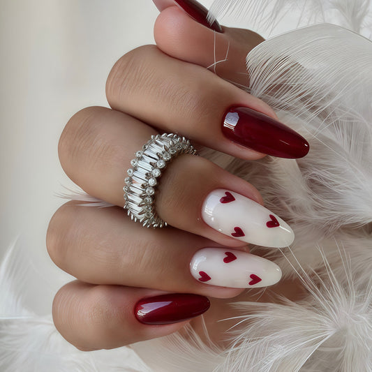 Romantic Elegance Glossy Long Almond Shaped Red and White Nail Set with Heart Accents