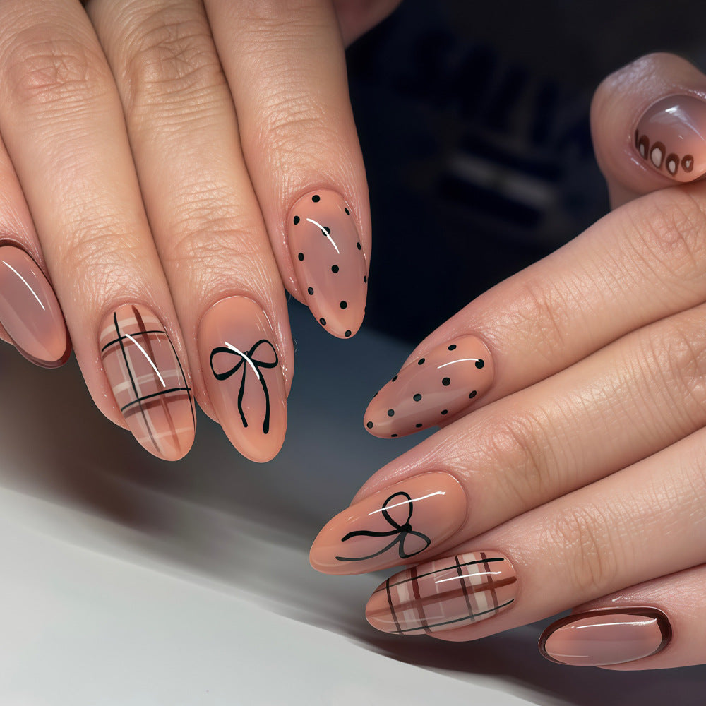 Chic Elegance Long Almond Beige with Playful Patterns and Delicate Accents Press On Nail Set