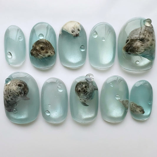 Whimsical Ocean Adventure Short Oval Aquamarine Soft Glossy Finish with Intriguing Seal Features Press on Nail Set