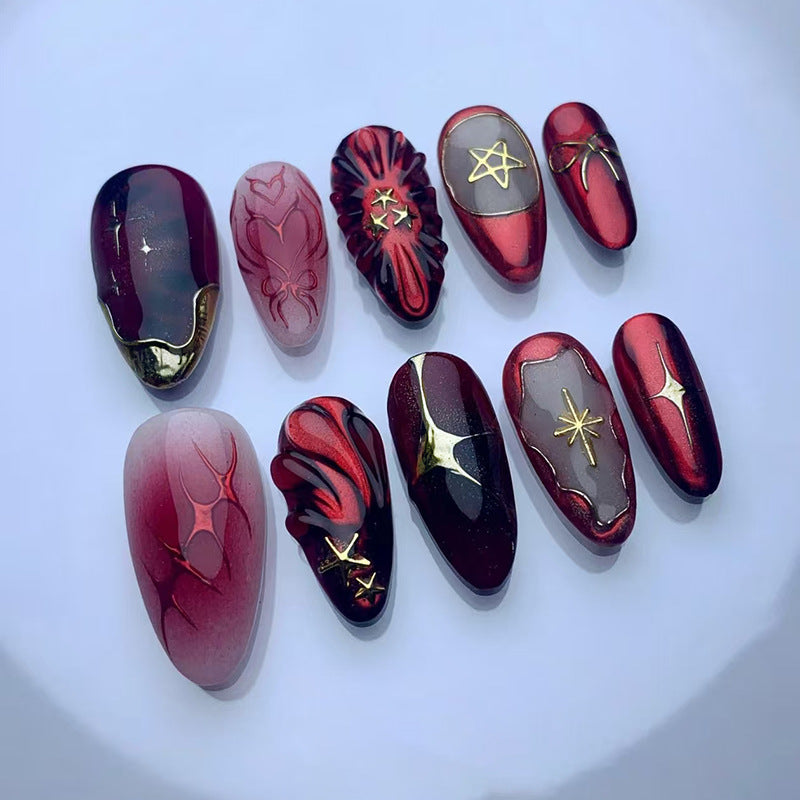 Mystical Night Medium Almond Red Press On Nail Set with Intricate Gold Detailing