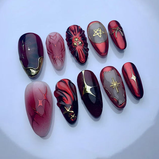 Mystical Night Medium Almond Red Press On Nail Set with Intricate Gold Detailing