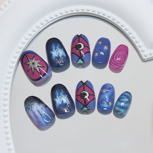 Cosmic Dreamland Press On Nail Set in Short Round Shape with Deep Blue and Vibrant Pink Featuring Stunning Celestial Designs
