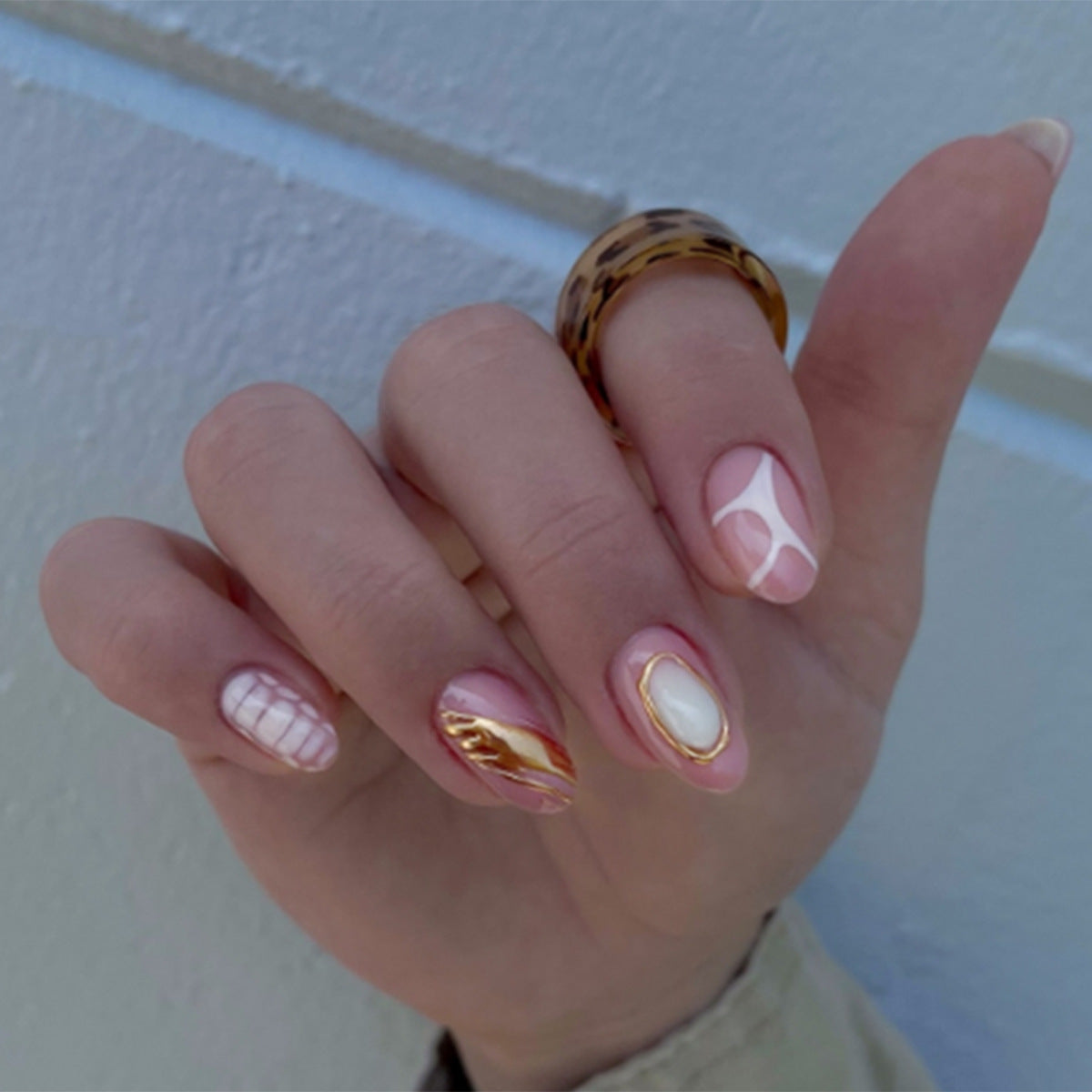 Bohemian Chic Medium Almond Pink Press-On Nail Set with Unique Marble Swirl Design