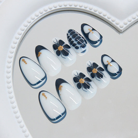 Elegant Floral Serenity Medium Almond Navy Blue Press-On Nail Set with Stunning Gold Accents