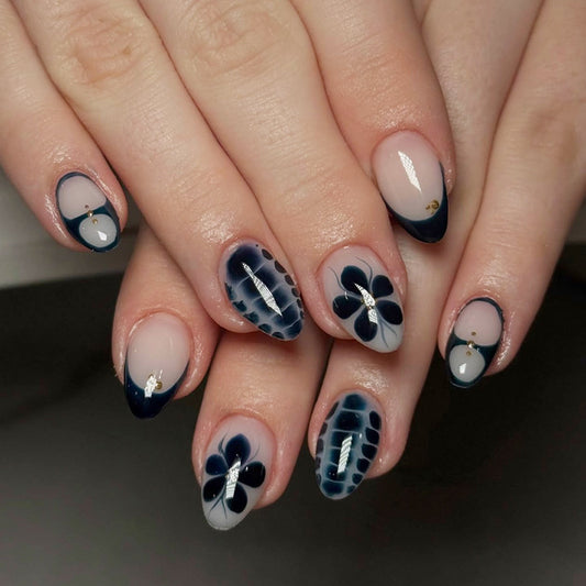 Elegant Nightfall Press-On Nail Set in Medium Almond Shape Deep Blue with Floral Accents and Glitter Details