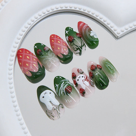 Whimsical Garden Medium Almond Green and Pink Nail Set with Playful Fruit and Floral Designs