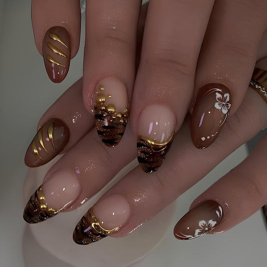 Coffee Caravan Elegant Medium Almond Brown Stiletto Nail Set with Glamorous Gold Accents and Floral Designs