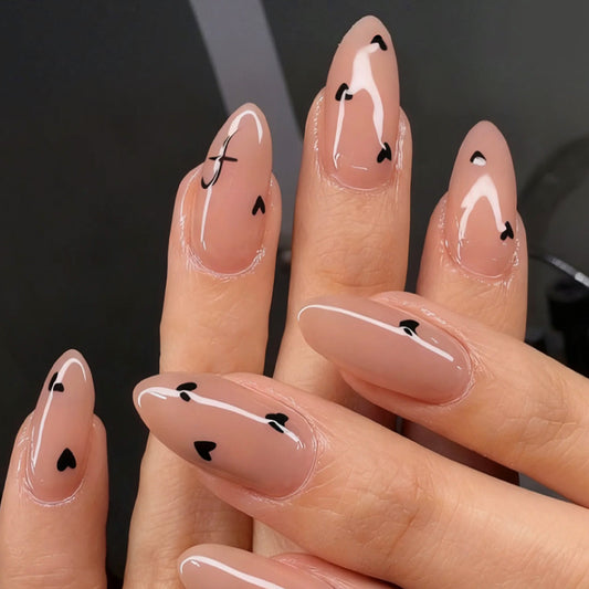 Romantic Elegance Long Almond Beige Nails with Heart Accents