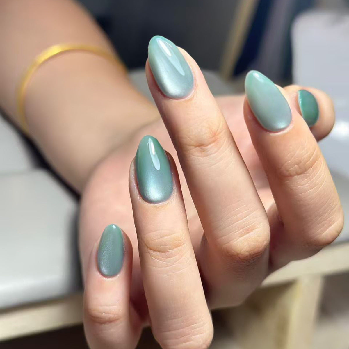 Serene Ocean Inspired Medium Almond Shaped Matte Green Press On Nail Set with Shimmering Finish