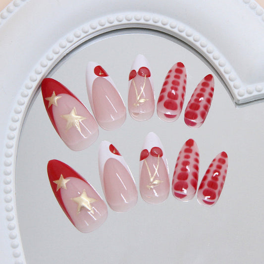 Festive Red and White Long Almond Press-on Nail Set with Elegant Gold Accents and Unique Cherry Designs