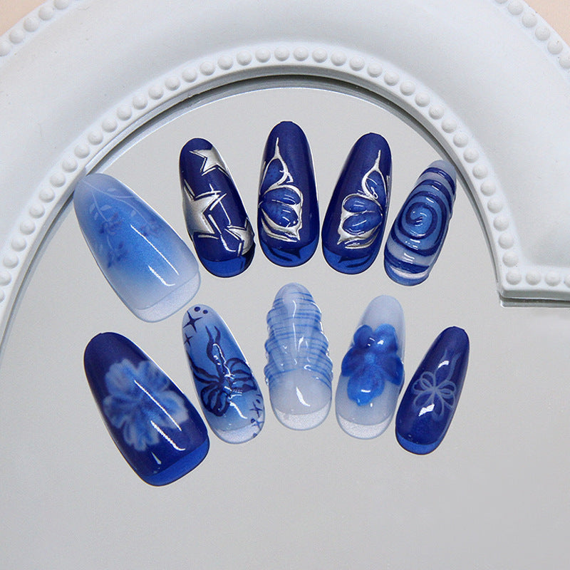 Oceanic Serenity Long Almond Blue Press On Nail Set with Elegant Floral Designs