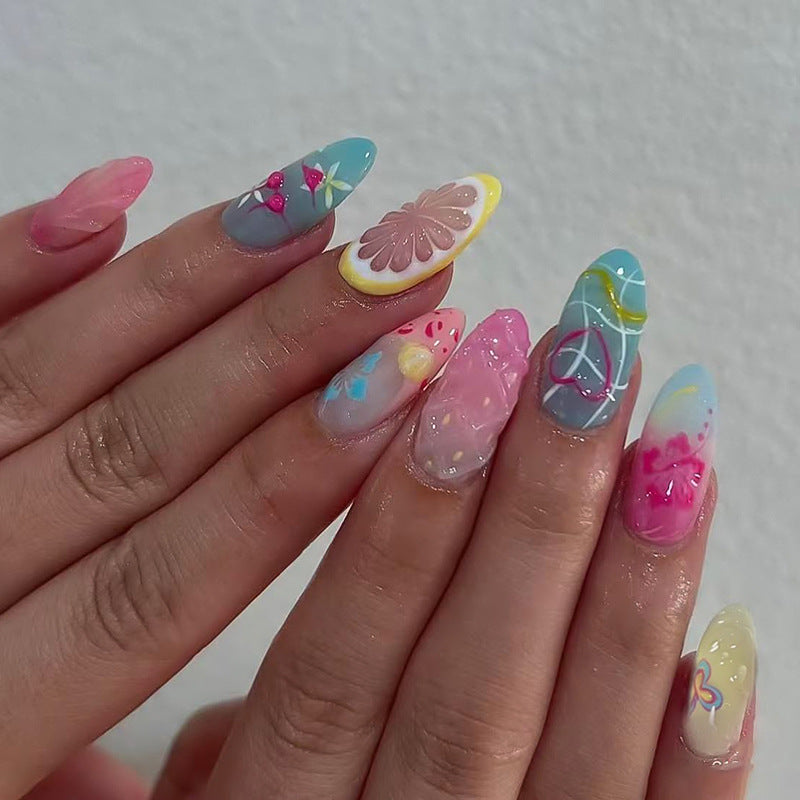 Whimsical Wonderland Long Almond Shaped Pastel Nail Set with Unique Floral Designs
