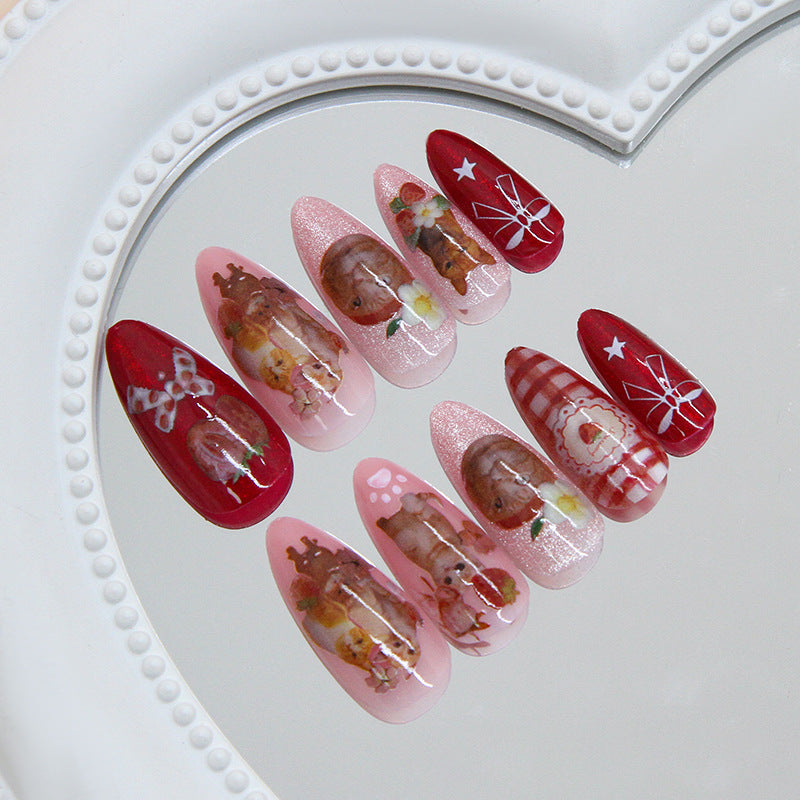 Festive Winter Wonderland Long Almond Pink and Red Nail Set Featuring Adorable Holiday Illustrations