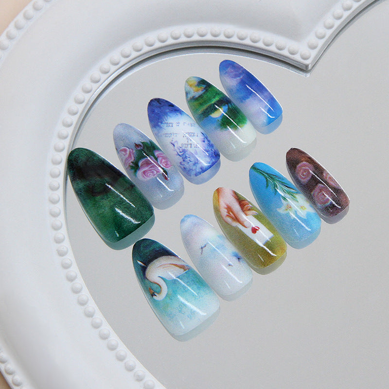 Whimsical Nature Inspired Long Almond Shaped Multi-Colored Nail Set Featuring Artistic Floral and Scenic Designs