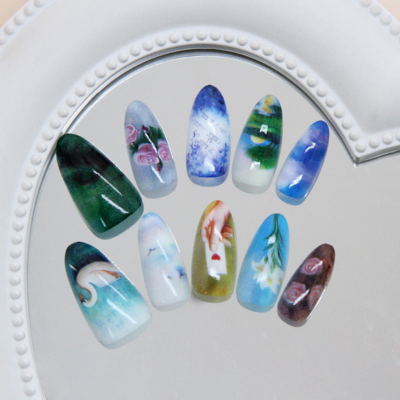 Enchanting Artistry Elegant Long Almond Shaped Multicolored Press On Nail Set with Intricate Hand-Painted Designs