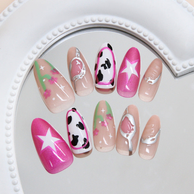 Chic Floral Fiesta Long Oval Pink and White Nail Set with Unique Cow Print and Star Accents