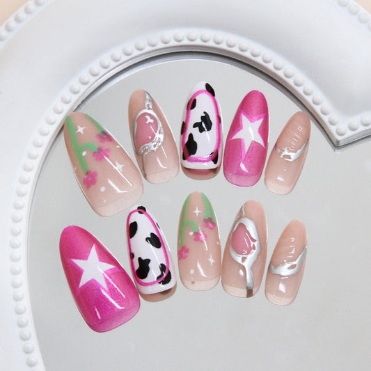 Chic Floral Fiesta Long Oval Pink and White Nail Set with Unique Cow Print and Star Accents