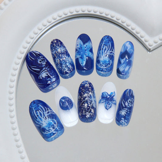 Ocean Breeze Elegance Long Almond Shaped Deep Blue Mottled Set with Intricate Floral Designs