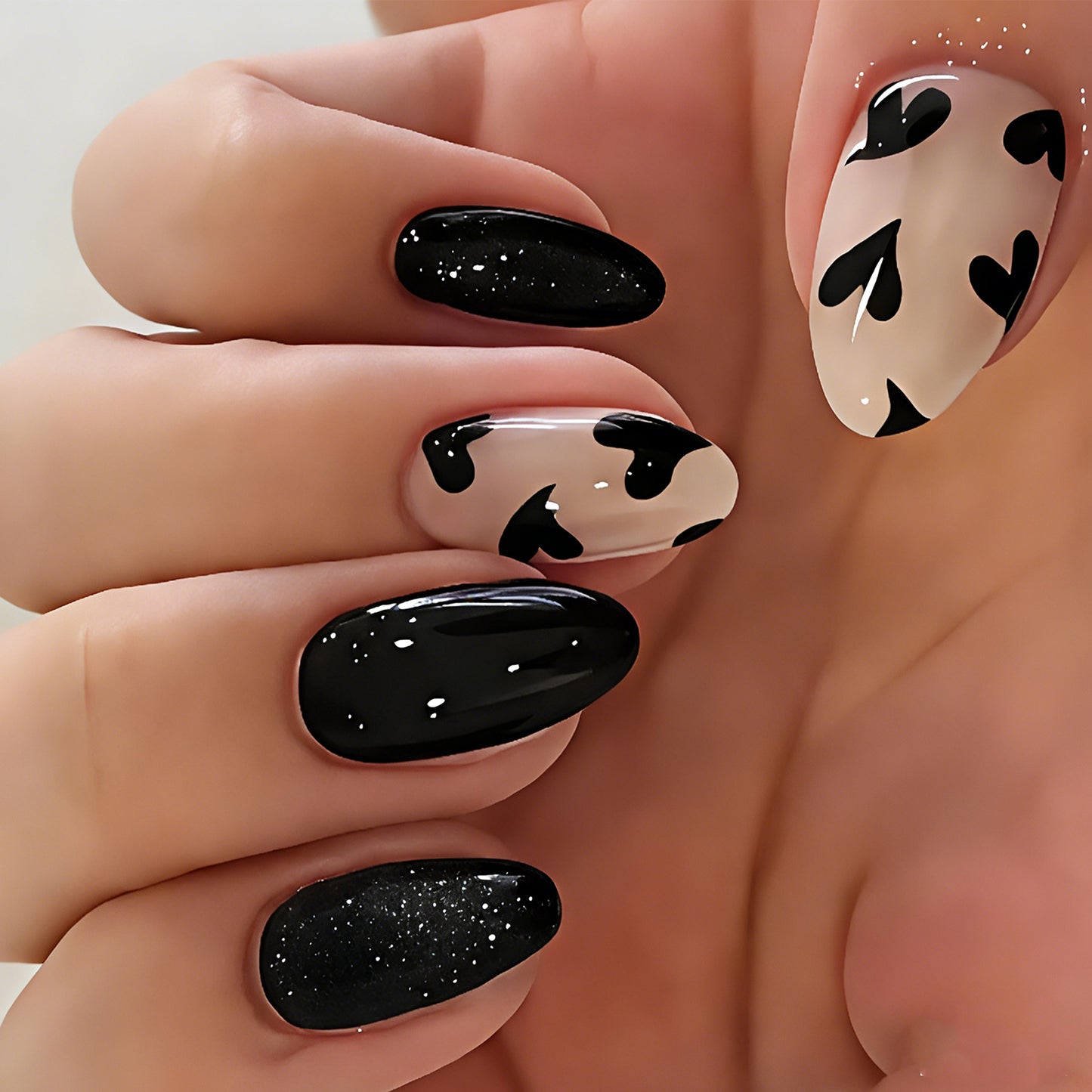 Charming Heartfelt Elegance Medium Oval Shaped Black and Beige Press on Nail Set with Unique Heart Patterns