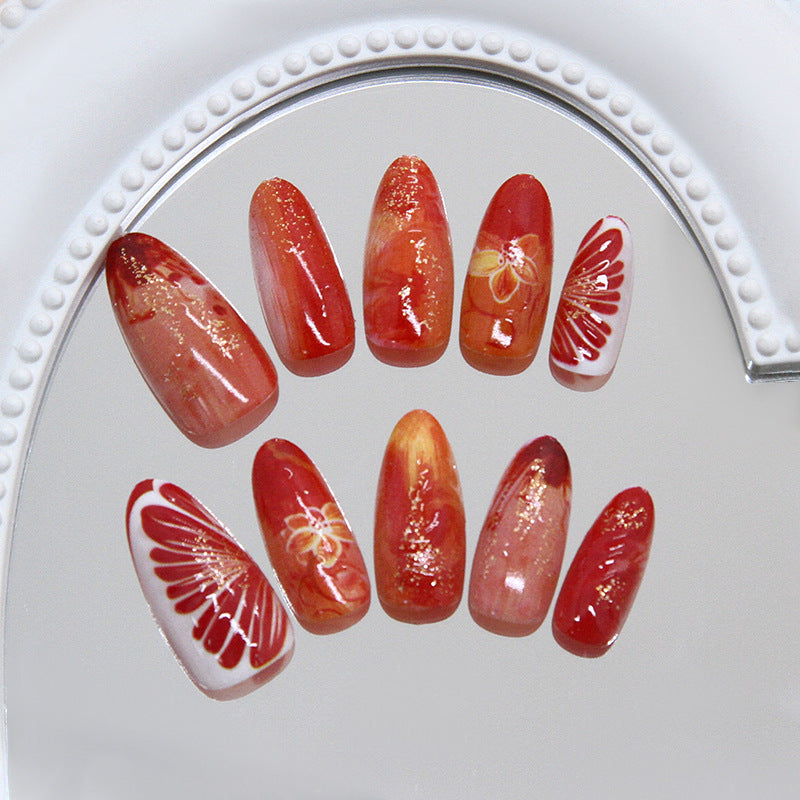 Vibrant Sunset Long Almond Shape Glossy Red Press On Nail Set with Floral Accents