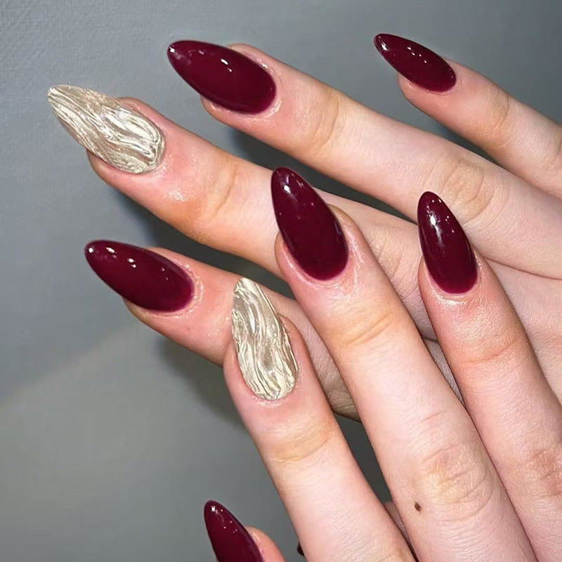 Glamorous Elegance Long Almond Shaped Deep Burgundy with Unique Textured Accent Nail Set