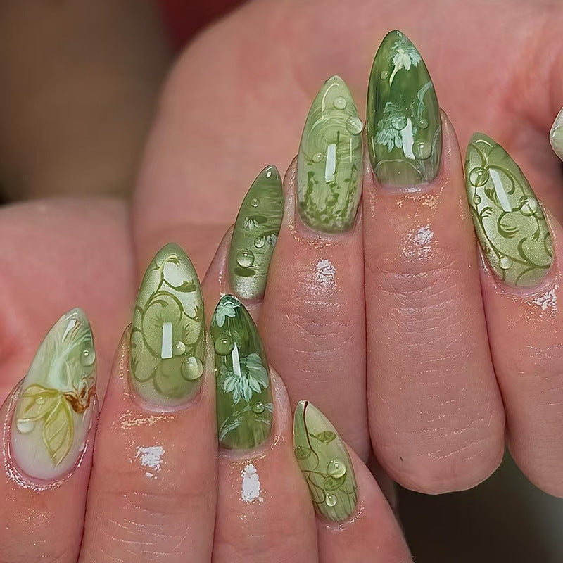 Enchanted Forest Green Long Almond Press On Nail Set with Intricate Floral Designs and Dewy Finish