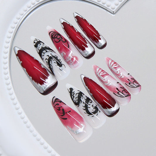 Mystical Crimson Fantasy Long Stiletto Red and White Press-On Nail Set with Intricate Black Designs