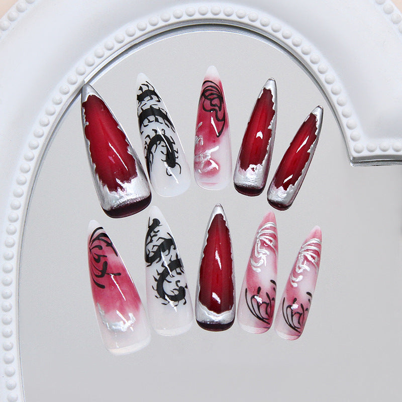 Mystical Elegance Long Stiletto Gradient Red and White Nail Set with Intricate Black Designs