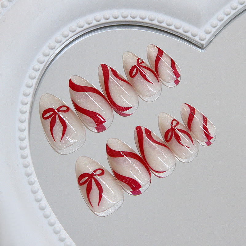 Festive Flair Long Almond Red and White Ribbon Accent Press On Nail Set