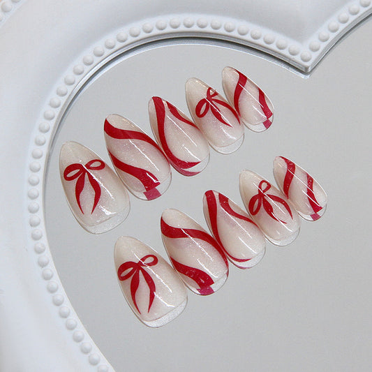 Festive Flair Long Almond Red and White Ribbon Accent Press On Nail Set