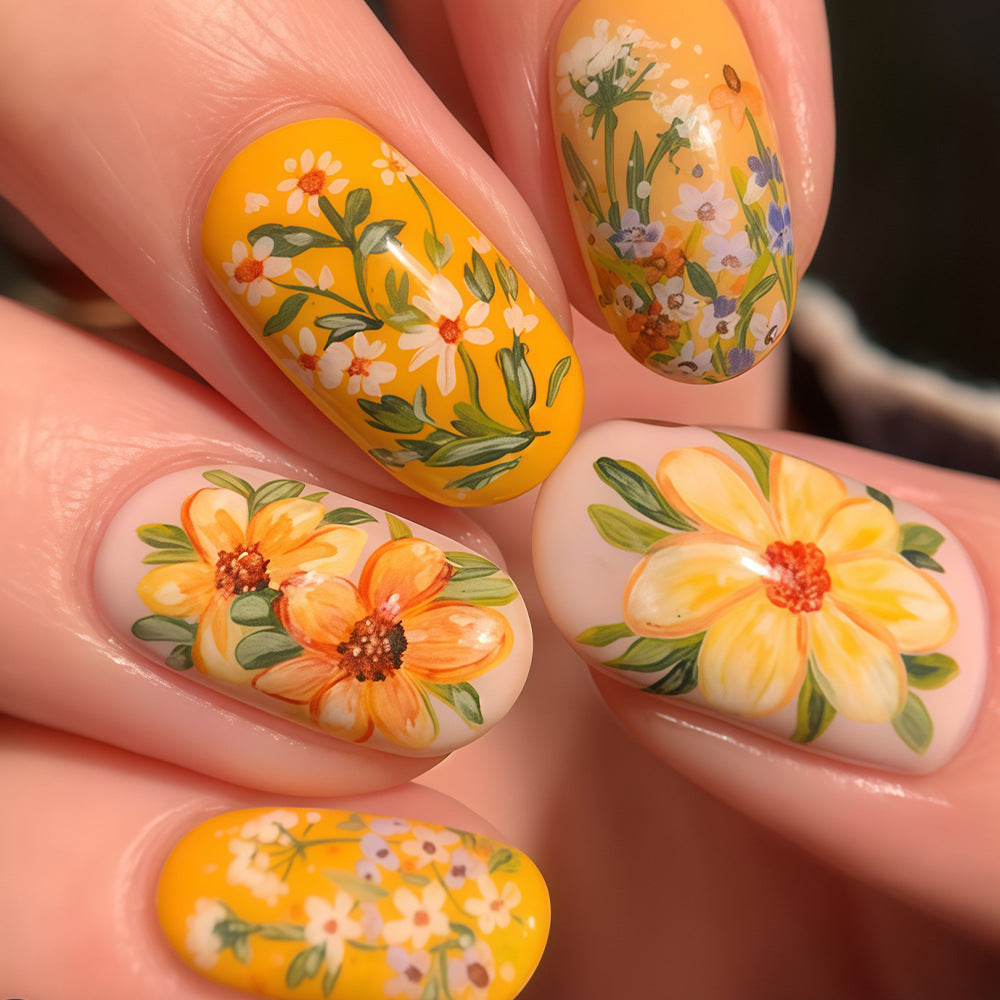 Spring Blossom Dream Medium Oval Yellow Floral Press-On Nail Set with Vibrant Botanical Designs