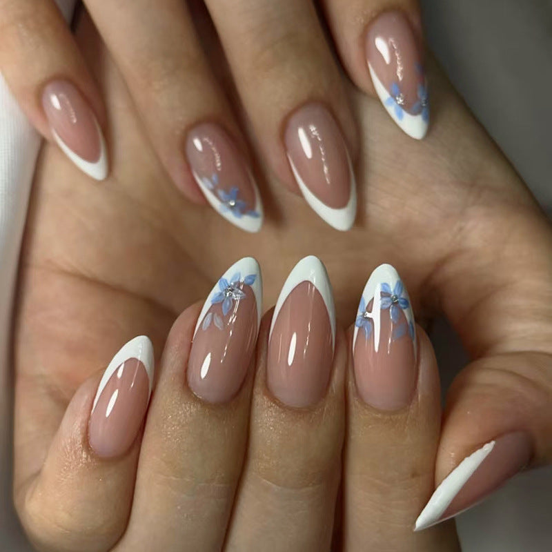 Whimsical Floral Medium Almond Beige with White Tips and Blue Flower Accents Nail Set
