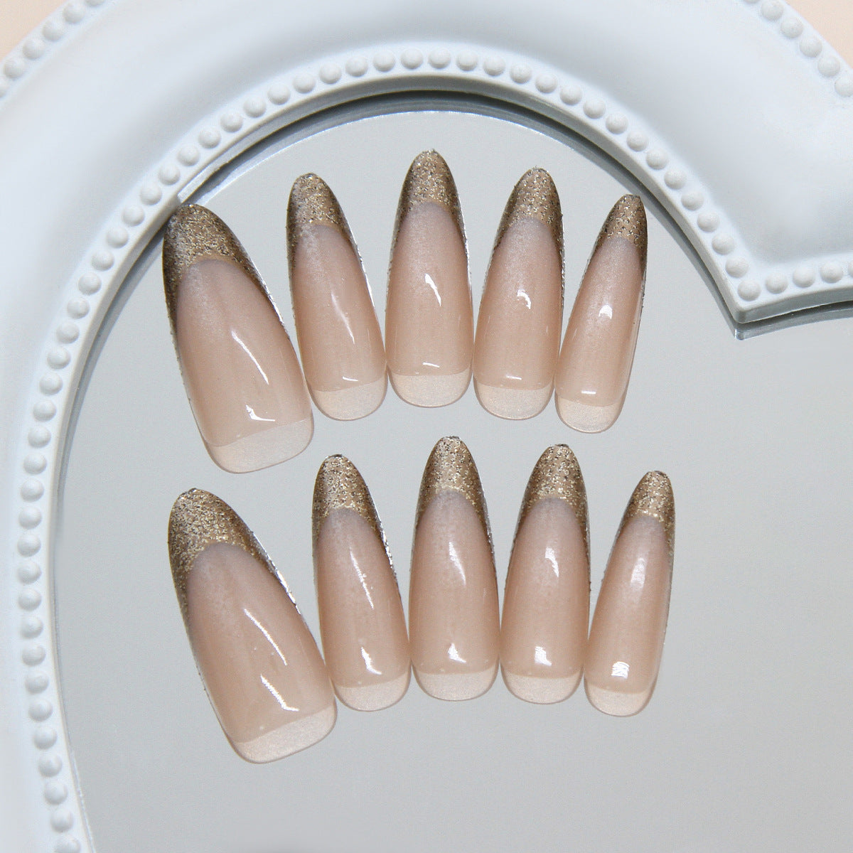 Glamorous Touch Medium Almond Beige Nails with Shimmering Tip Design
