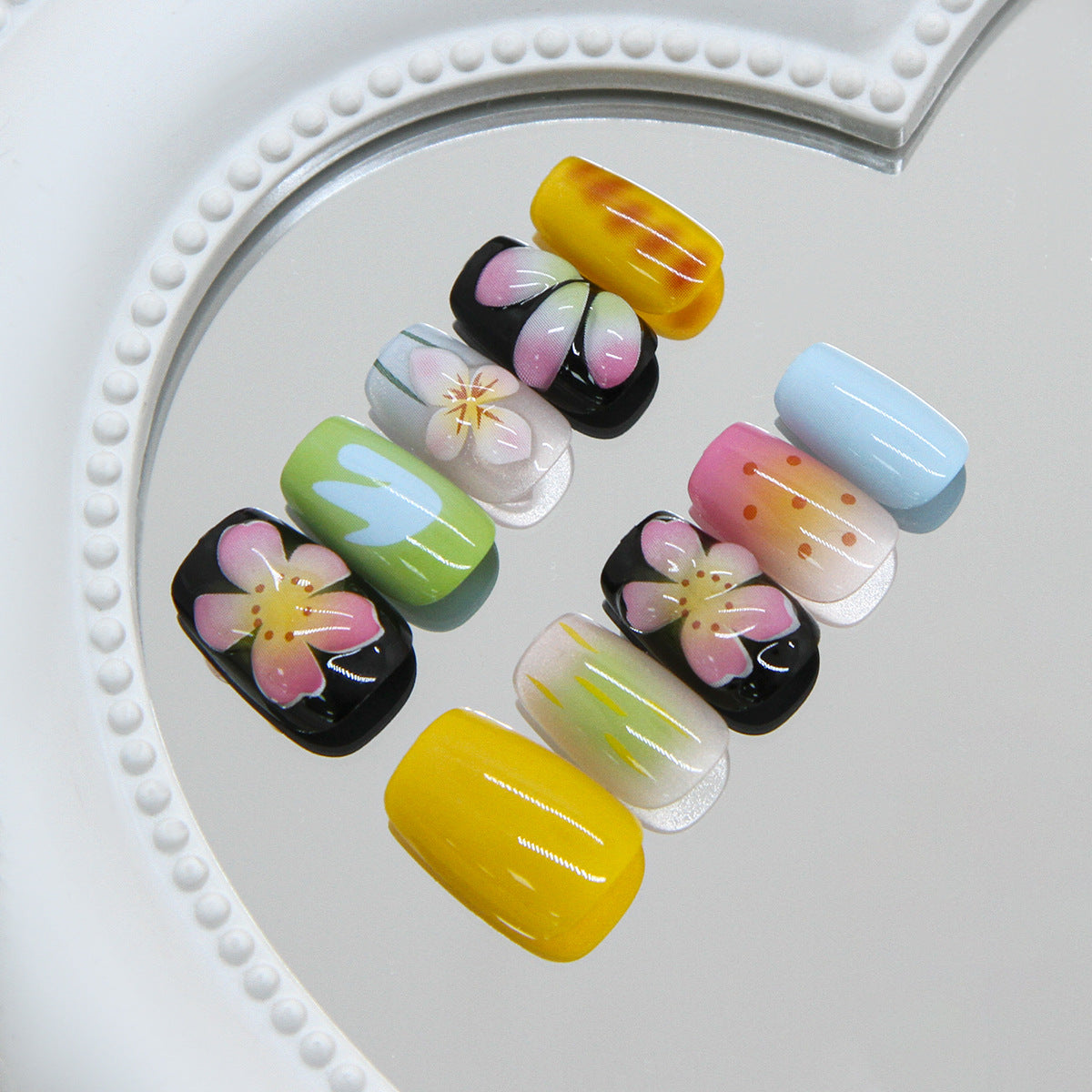 Floral Delight Medium Almond Pastel Press On Nail Set with Unique Flower Designs