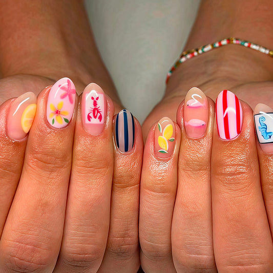 Tropical Paradise Short Almond Press On Nail Set in Pink with Unique Floral and Nautical Art Designs