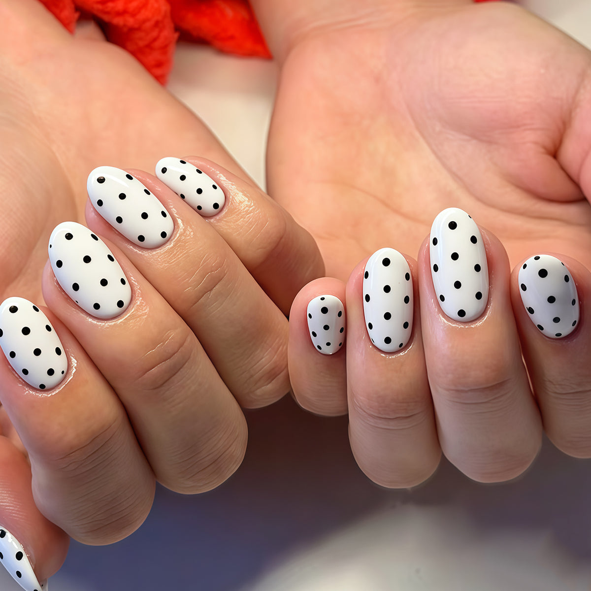 Chic Polka Dot Design Medium Oval White Nails with Glossy Finish