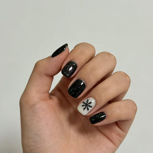 Winter Wonderland Glamour Black Short Square Press On Nail Set with Sparkling Finish and Festive Snowflake Design