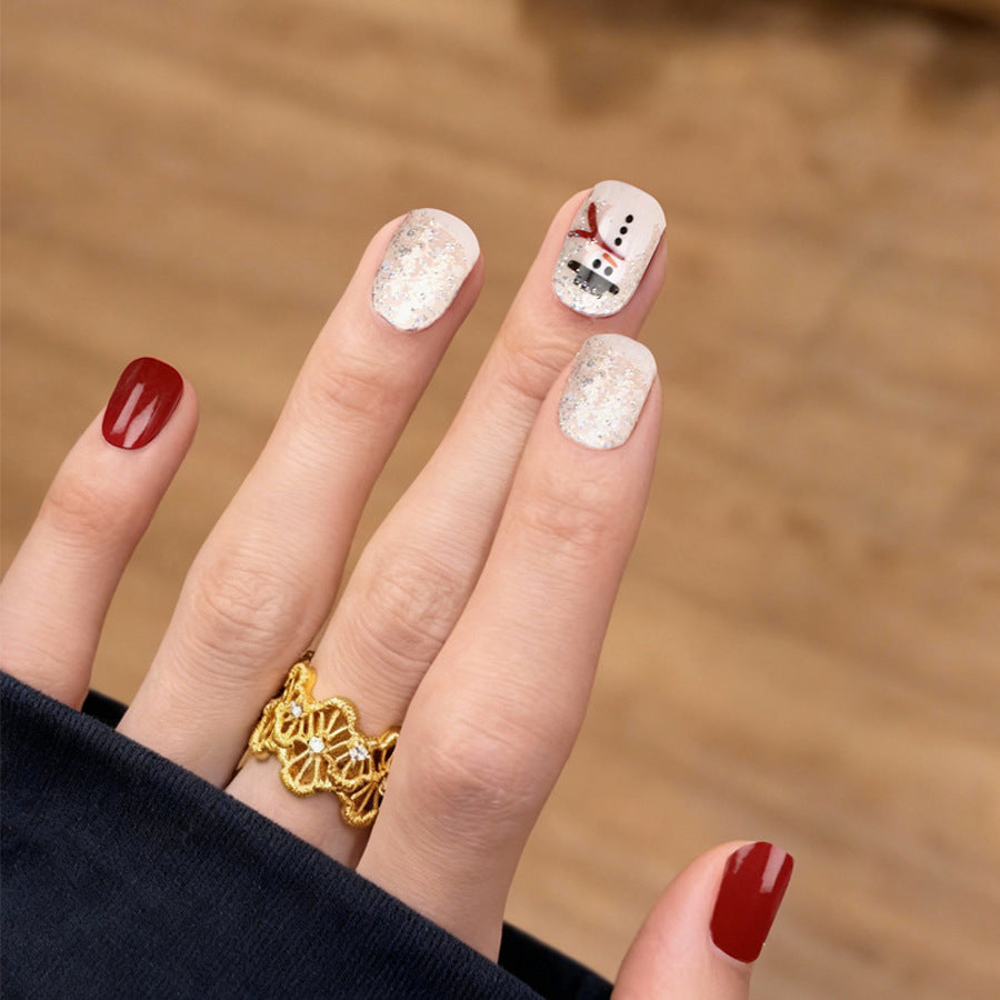 Winter Wonderland Short Squoval Red and Glitter White Press-On Nail Set with Whimsical Snowman Design