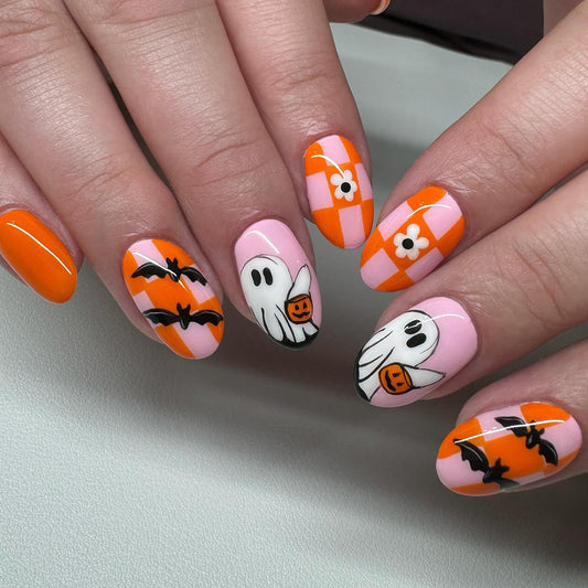 Hauntingly Whimsical Medium Round Shaped Orange and Pink Press On Nails with Spooky Halloween Designs
