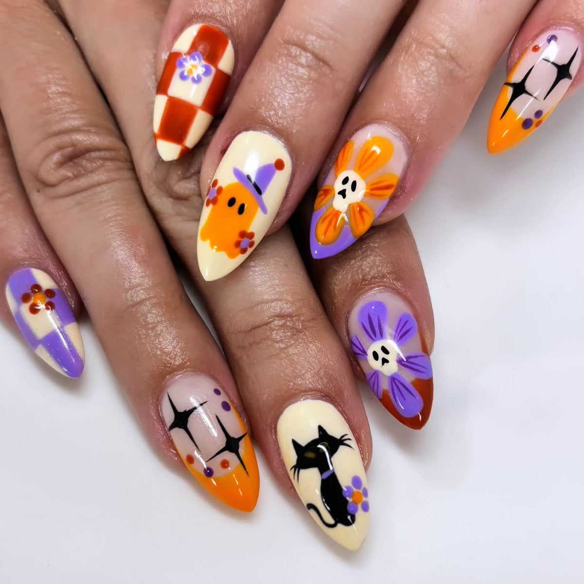 Autumn Charm Medium Almond Multicolor Press On Nail Set Featuring Whimsical Floral and Ghost Designs