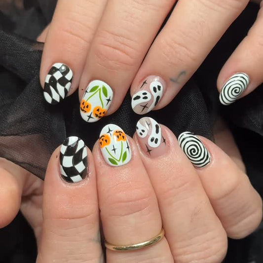 Spooky Vibes Medium Oval Black and White Checkerboard Nail Set with Pumpkin Art