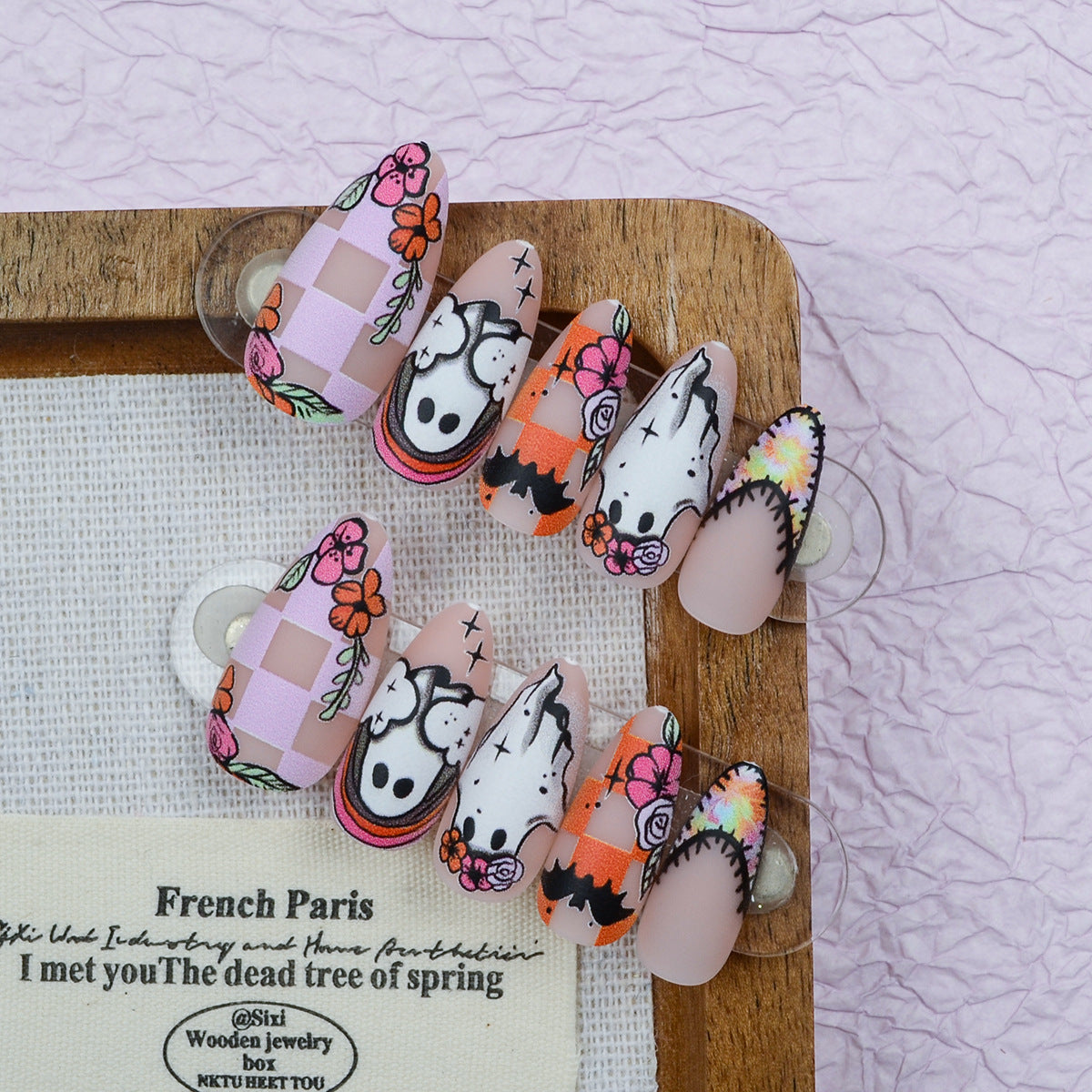 Spooky Floral Medium Almond Press On Nail Set with Unique Artistic Designs