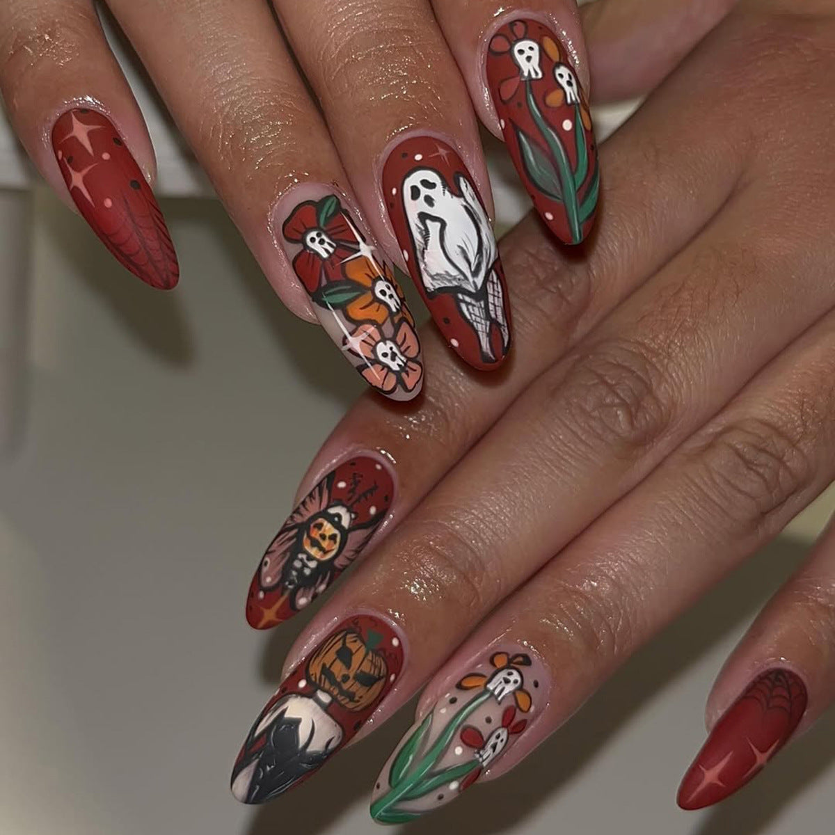 Hauntingly Beautiful Medium Almond Red Floral Nail Set with Unique Ghost Art